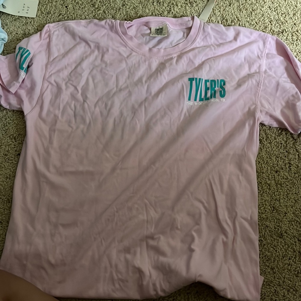 baby pink with turquoise lettering tyler’s shirt size large